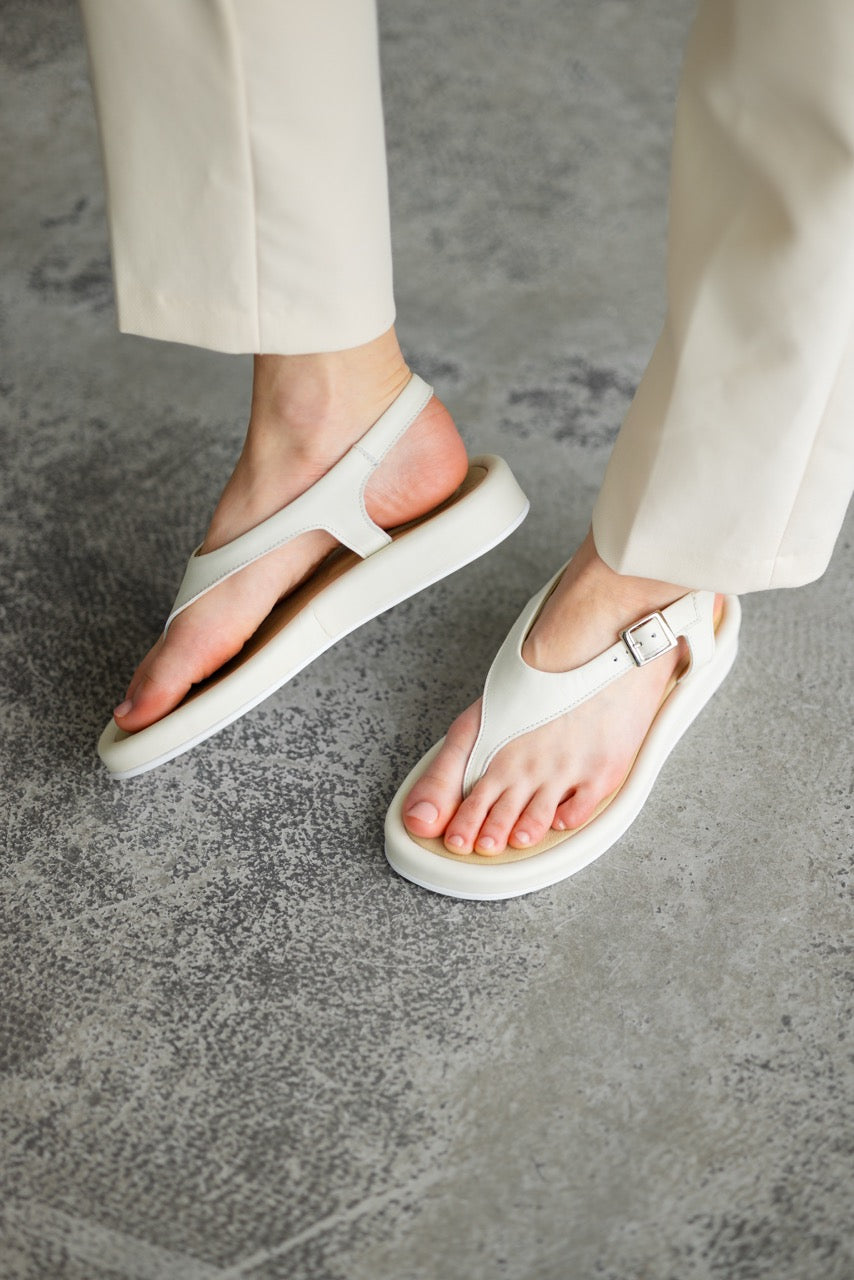 Handmade light beige leather sandals with minimalist summer design