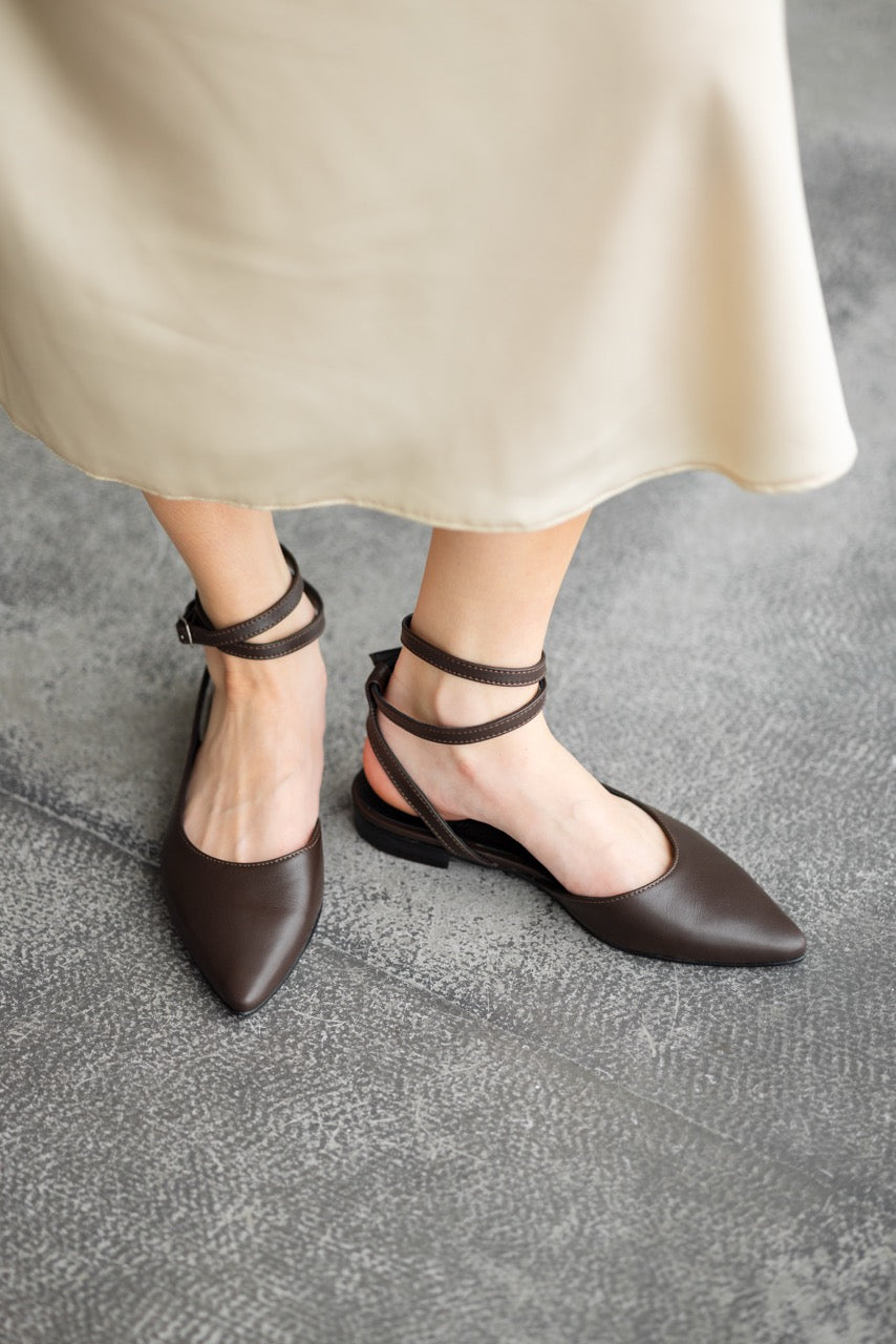 Brown leather slingback ballet flats with pointed toe and ankle straps