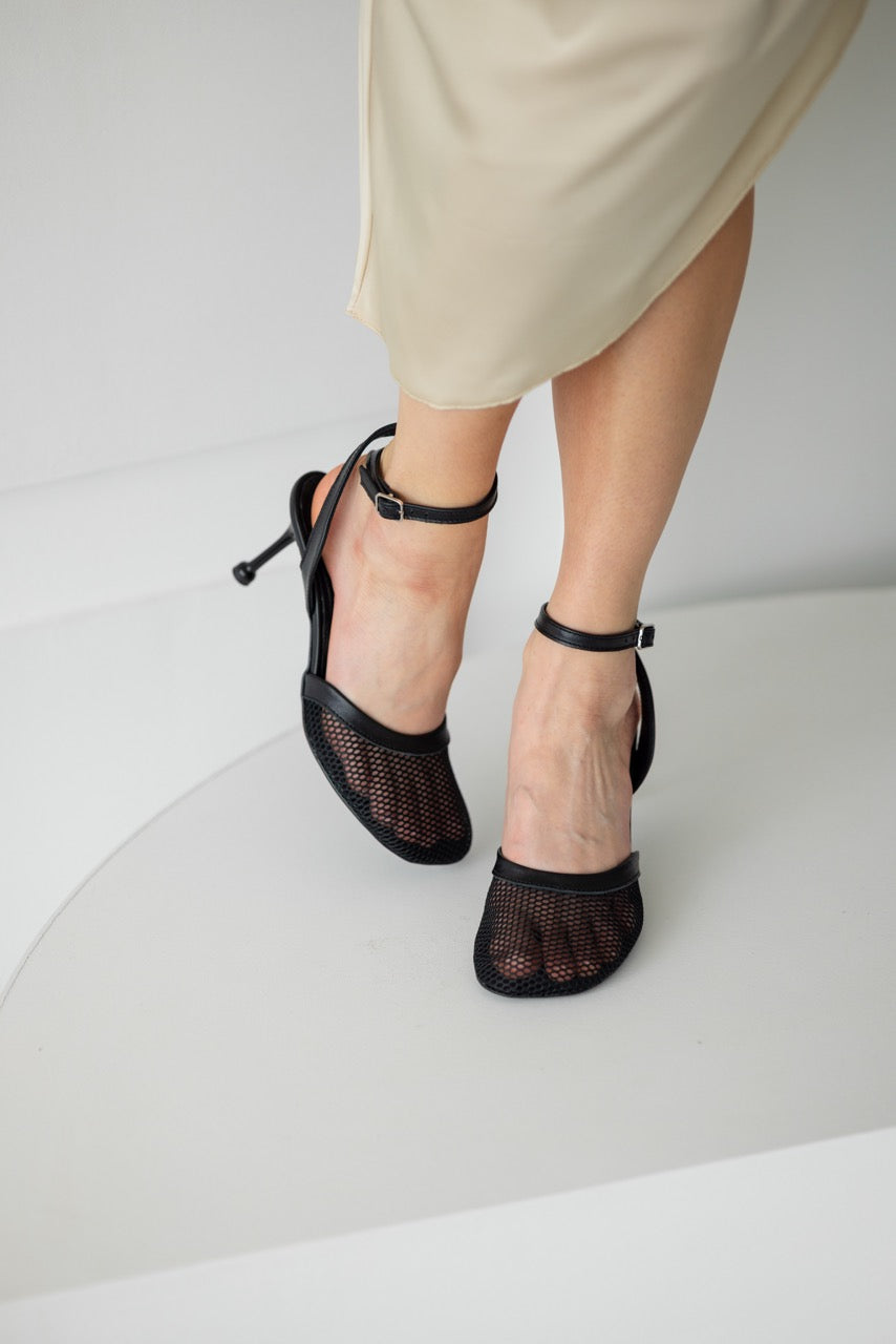 Black mesh heeled sandals with leather ankle strap and buckle closure