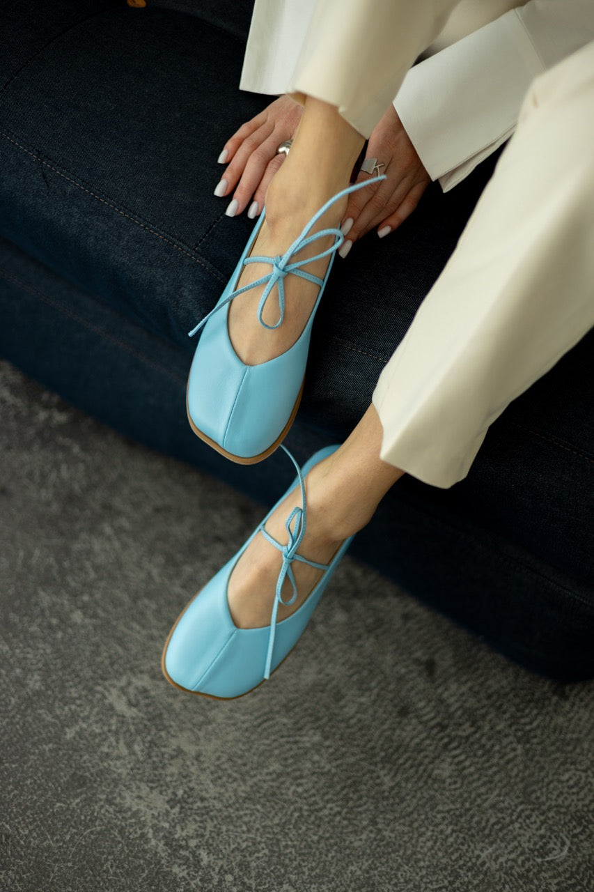 Pink leather ballet flats strap detail top view