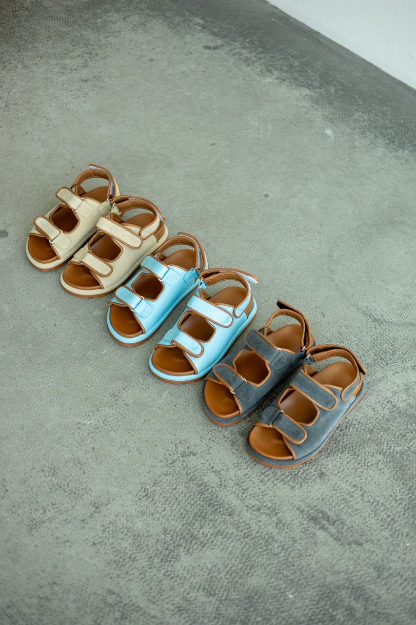 Blue leather sandals adjustable straps ergonomic design