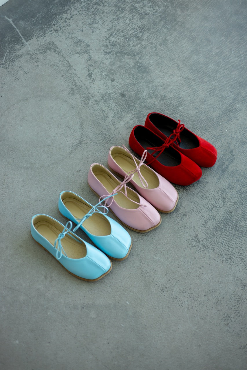 Blue leather ballet flats smooth leather close-up