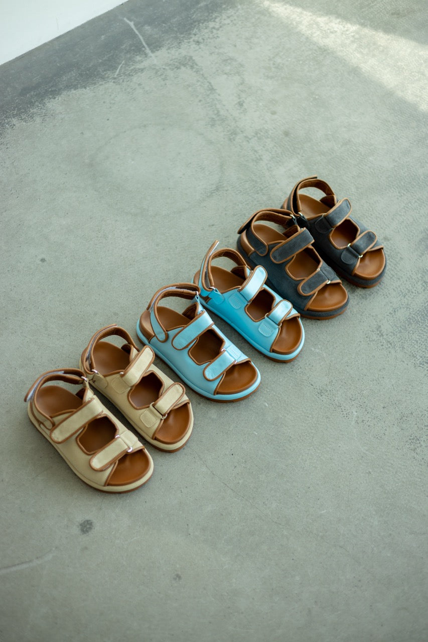 Blue leather sandals adjustable straps ergonomic design