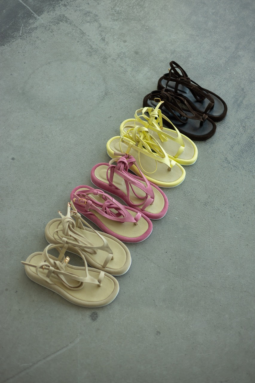 Lace up leather sandals with ankle wrap straps in yellow