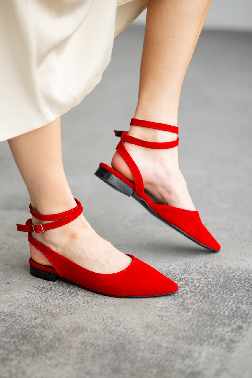Women's red ballet flats with open back and adjustable ankle straps