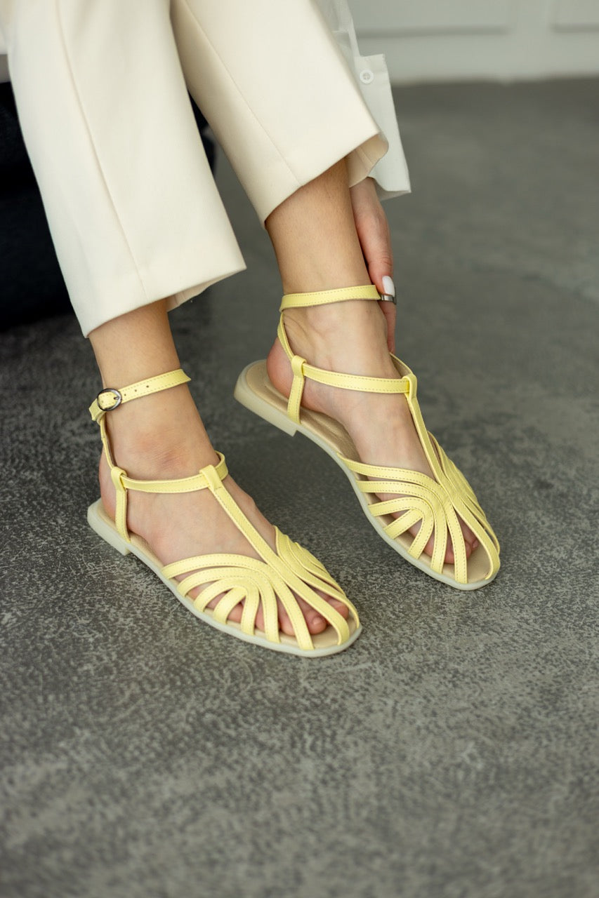Yellow leather strap sandals for women with decorative toe design