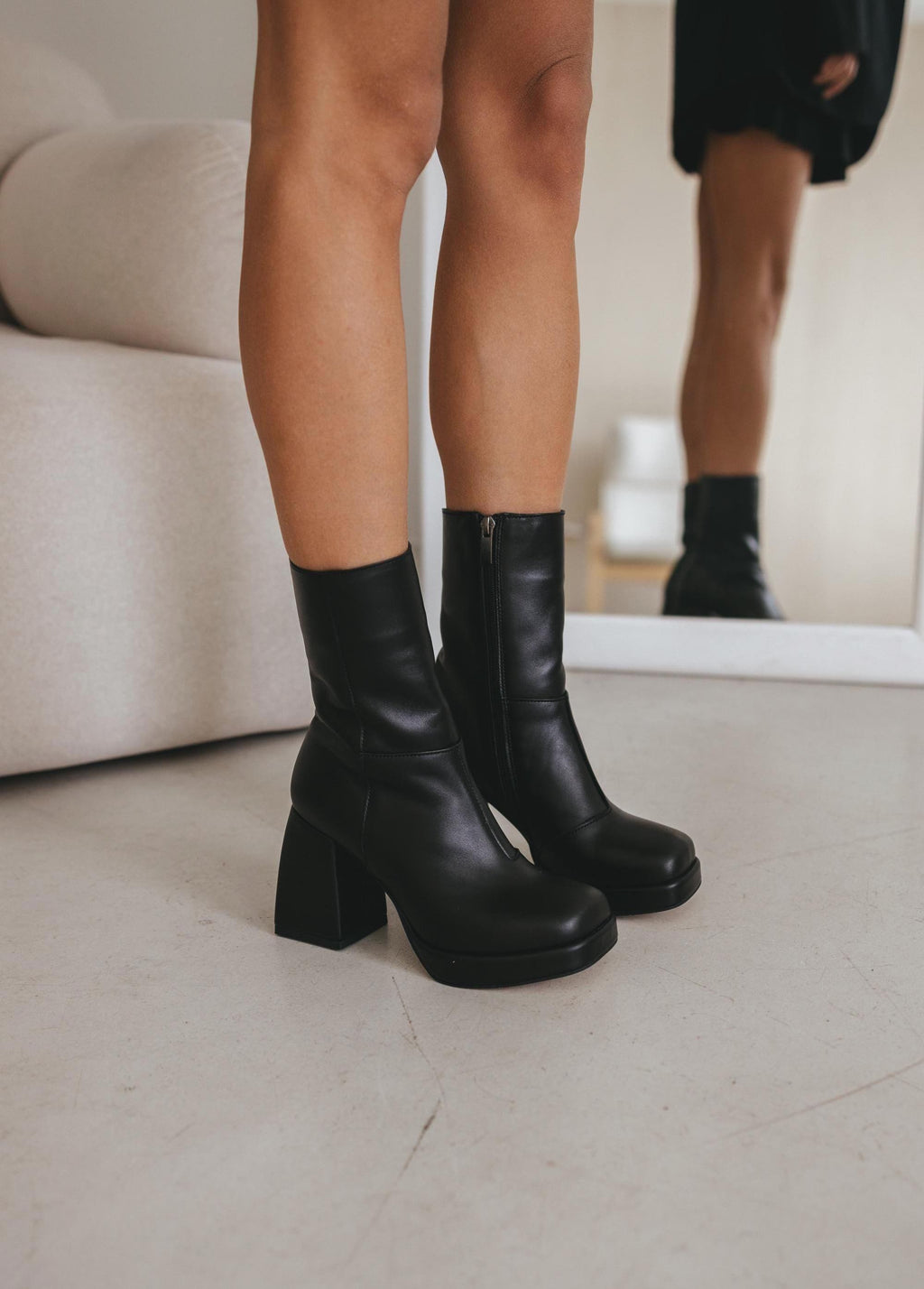 Black leather ankle boots square toe side zipper front view