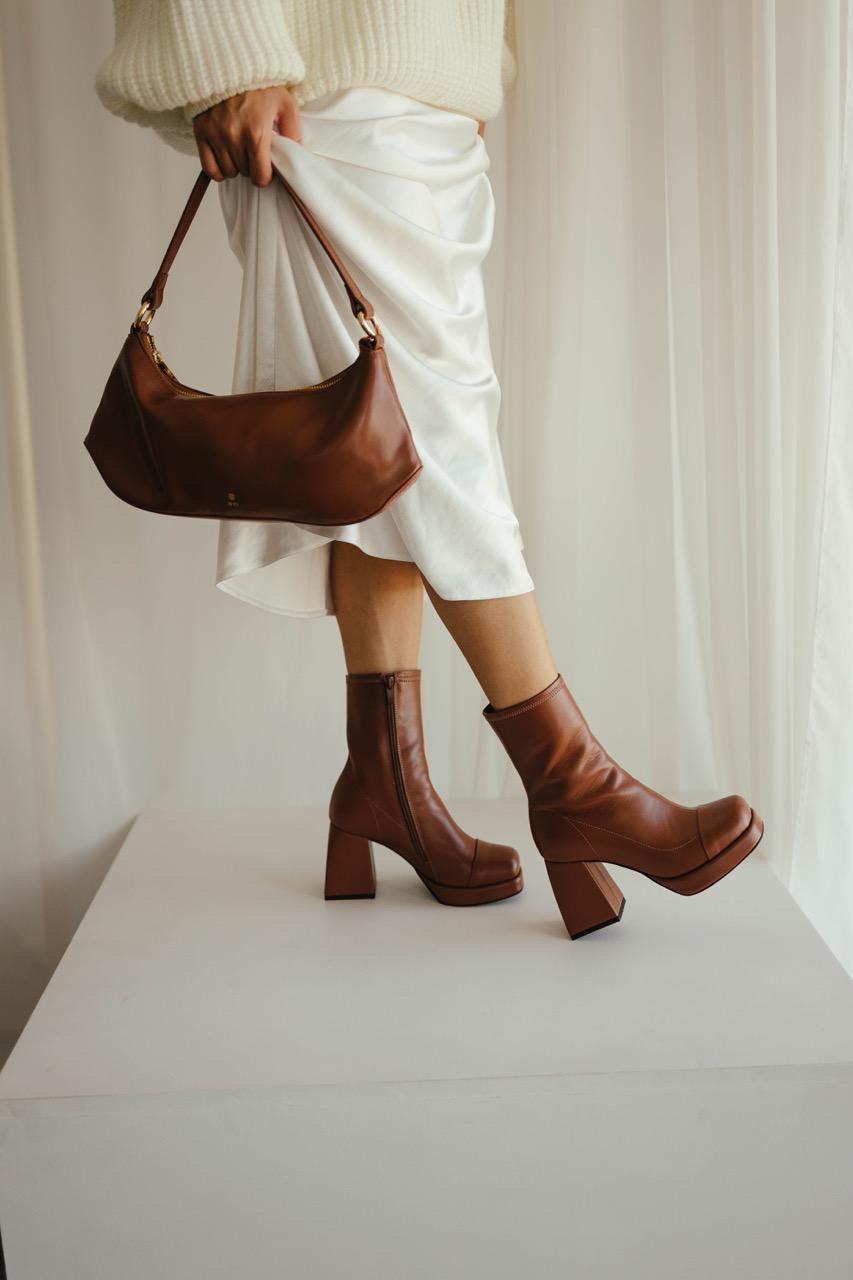 Handmade brown leather booties square toe detail close-up