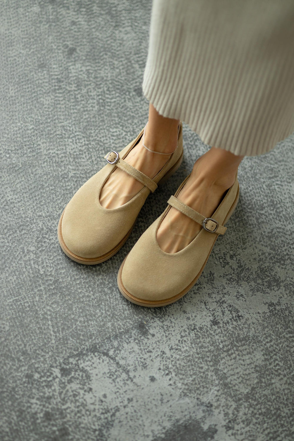 Suede flats with buckle strap front view