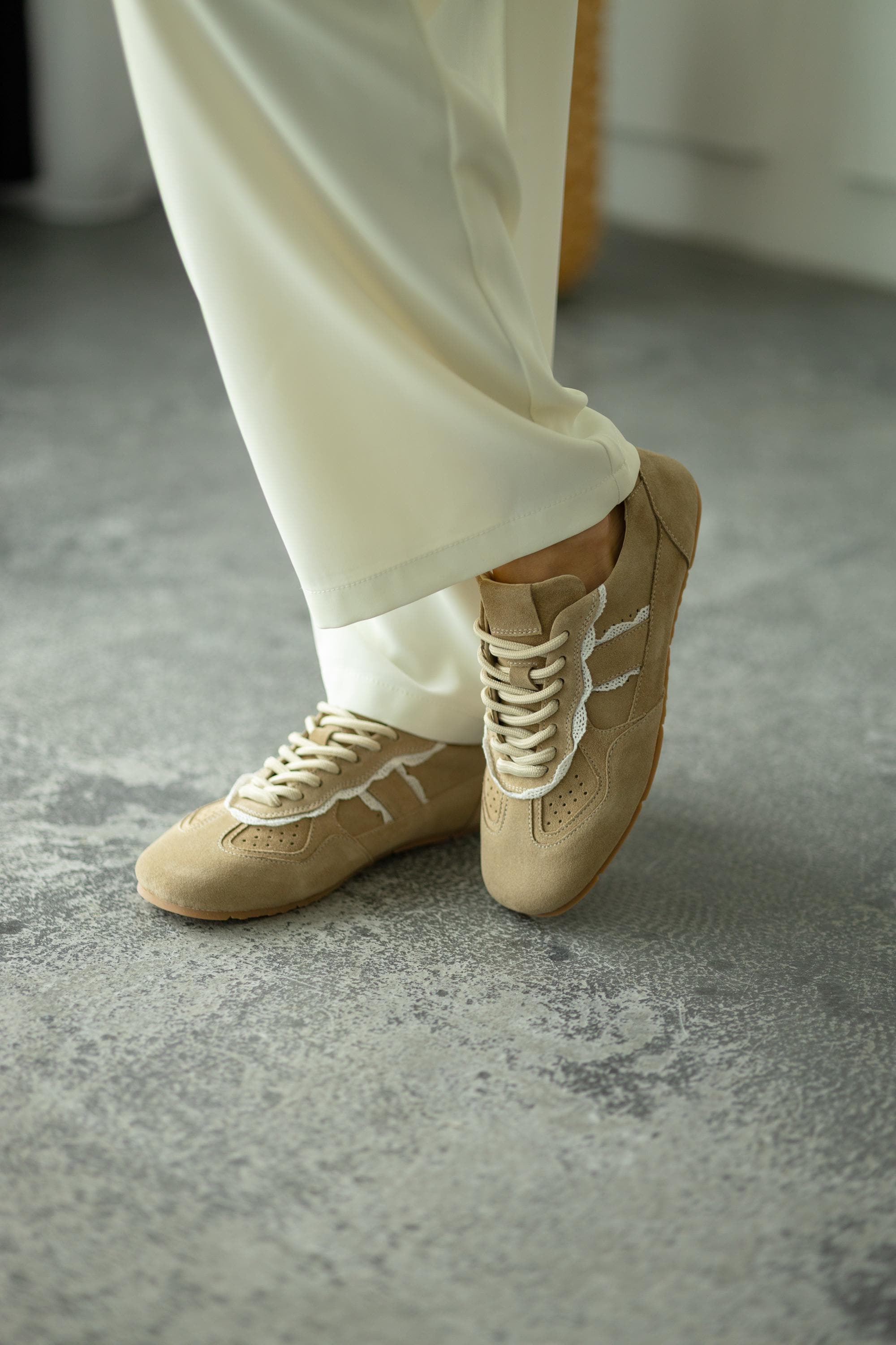 Women’s suede sneakers with lace inserts elegant sport style